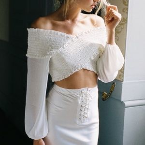 With Jéan frances white top